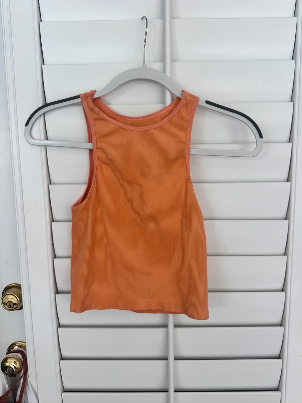 One Step Ahead Orange Ribbed Racerback Tank